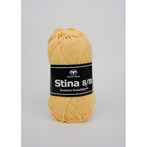 Stina 8/8 Garn Bomull 50 g lys gul 232 Svarta Fåret